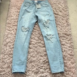 Distressed denim jeans
